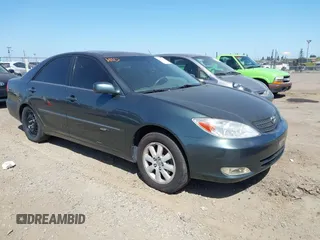 2003 Toyota Camry LE z VIN 4T1BF30K83U542076, wystawiony jako IAAI lot #42093225 z przebiegiem Nie podano mil oraz . Historia ofert i sprzedaży dostępna na DreamBid. Obrazek 1.