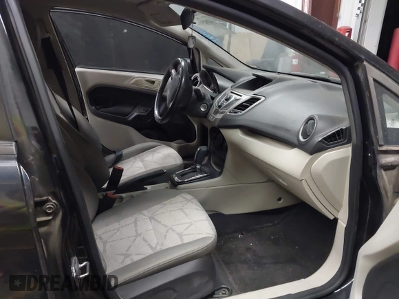 2013 Ford Fiesta SE with VIN 3FADP4EJ1DM107945, listed as a IAAI auction lot 42025064 with Not Provided miles and . Bid and sale history available at DreamBid. Image 5.