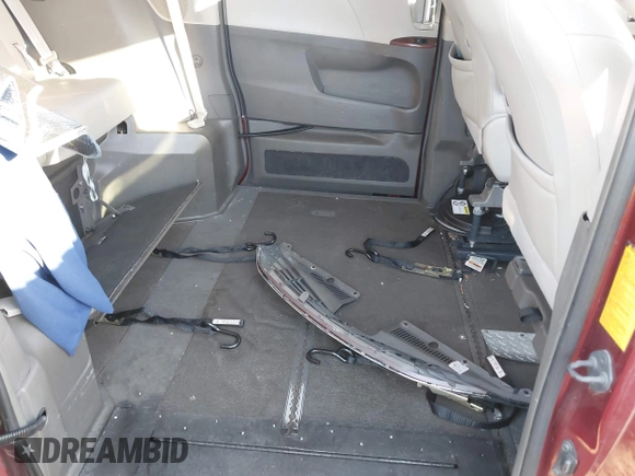 2014 Toyota Sienna XLE with VIN 5TDYK3DCXES473671, listed as a IAAI auction lot 42243030 with 70,052 mi miles and . Bid and sale history available at DreamBid. Image 8.
