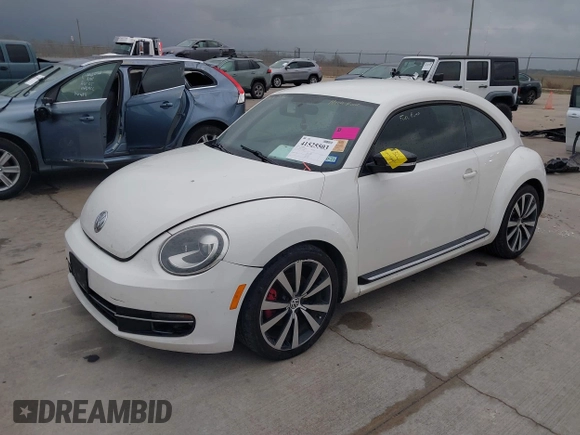 2012 Volkswagen Beetle Turbo with VIN 3VWVA7AT3CM650301, listed as a IAAI auction lot 41525503 with Not Provided miles and . Bid and sale history available at DreamBid. Image 2.