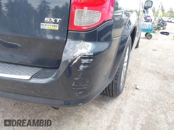 2018 Dodge Grand Caravan SXT with VIN 2C4RDGCG1JR324739, listed as a IAAI auction lot 42230796 with 197,584 mi miles and . Bid and sale history available at DreamBid. Image 17.
