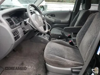 2003 Chevrolet Tracker ZR2 z VIN 2CNBJ734736946410, wystawiony jako Copart lot #82210474 z przebiegiem 61 414 mil mil oraz Szkoda całkowita • Salvage title. Historia ofert i sprzedaży dostępna na DreamBid. Obrazek 7.