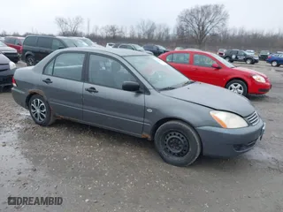 2006 Mitsubishi Lancer ES with VIN JA3AJ26E76U066867, listed as a IAAI auction lot 41904428 with 247,460 mi miles. Bid and sale history available at carsss.com. Image 1.