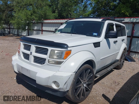 2011 Dodge Nitro Heat with VIN 1D4PT4GX9BW587284, listed as a IAAI auction lot 41998357 with 100,366 mi miles and . Bid and sale history available at DreamBid. Image 17.