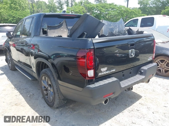 2021 Honda Ridgeline Sport with VIN 5FPYK3F15MB026171, listed as a IAAI auction lot 42265057 with 92,981 mi miles and . Bid and sale history available at DreamBid. Image 3.