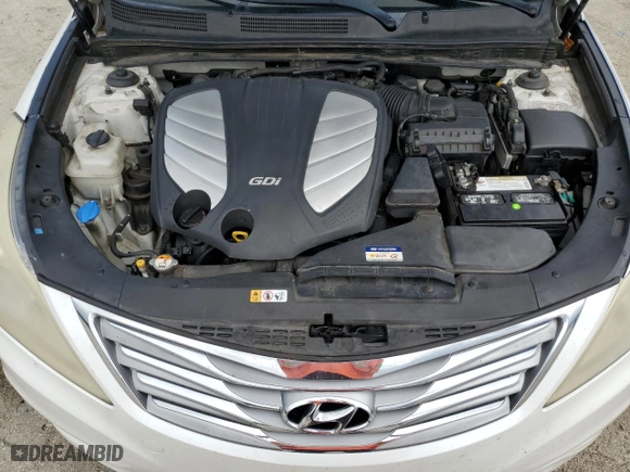 2013 Hyundai Azera with VIN KMHFG4JGXDA241200, listed as a Copart auction lot 71171354 with 249,007 mi miles and Salvage Title. Bid and sale history available at carsss.com. Image 12.