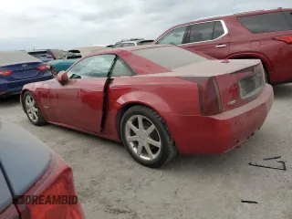 2005 Cadillac XLR z VIN 1G6YV34A855601016, wystawiony jako Copart lot #74436784 z przebiegiem Nie podano mil oraz Szkody całkowita. Historia ofert i sprzedaży dostępna na DreamBid. Obrazek 2.