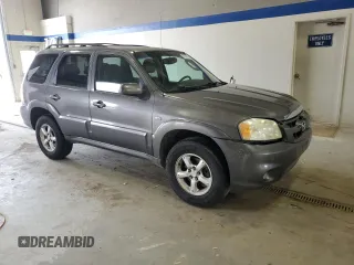 2005 Mazda Tribute S with VIN 4F2CZ96115KM59847, listed as a Copart auction lot 67740144 with 217,053 mi miles and Salvage Title. Bid and sale history available at carsss.com. Image 4.