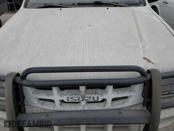 2002 Isuzu Rodeo S with VIN 4S2DM58W324327147, listed as a Copart auction lot 75194104 with Not Provided miles and Salvage Title. Bid and sale history available at DreamBid. Image 12.