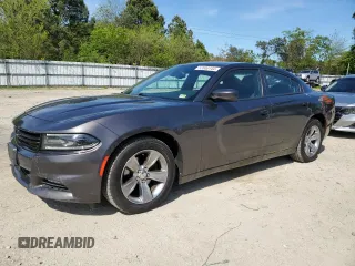 2015 Dodge Charger SXT with VIN 2C3CDXHG8FH794623, listed as a Copart auction lot 52000144 with 145,624 mi miles and Salvage Title. Bid and sale history available at DreamBid. Image 1.