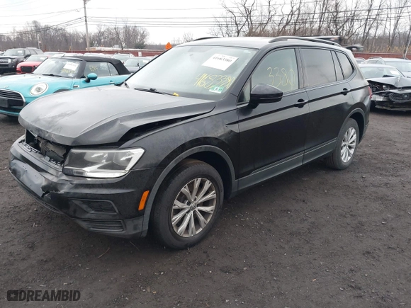 2018 Volkswagen Tiguan S with VIN 3VV1B7AX9JM091210, listed as a IAAI auction lot 41683380 with 63,627 mi miles. Bid and sale history available at carsss.com. Image 18.