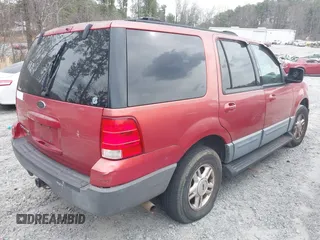 2003 Ford Expedition XLT Value with VIN 1FMPU16W03LC14117, listed as a IAAI auction lot 41682599 with 251,563 mi miles. Bid and sale history available at carsss.com. Image 4.