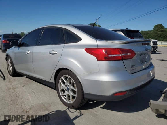 2015 Ford Focus SE z VIN 1FADP3F25FL283595, wystawiony jako Copart lot #57966705 z przebiegiem 182 405 mil mil oraz Szkoda całkowita • Salvage title. Historia ofert i sprzedaży dostępna na DreamBid. Obrazek 2.