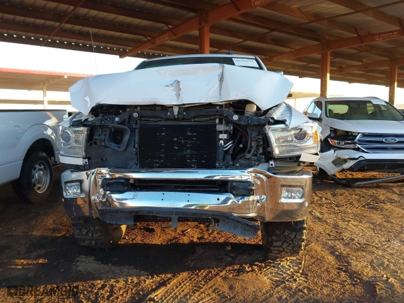 2018 Ram 2500 Laramie with VIN 3C6UR5FL0JG115269, listed as a IAAI auction lot 41310111 with 134,756 mi miles. Bid and sale history available at carsss.com. Image 6.