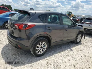 2014 Mazda CX-5 Sport z VIN JM3KE2BE8E0421316, wystawiony jako Copart lot #56548005 z przebiegiem 203 096 mil mil oraz Szkoda całkowita • Salvage title. Historia ofert i sprzedaży dostępna na DreamBid. Obrazek 3.