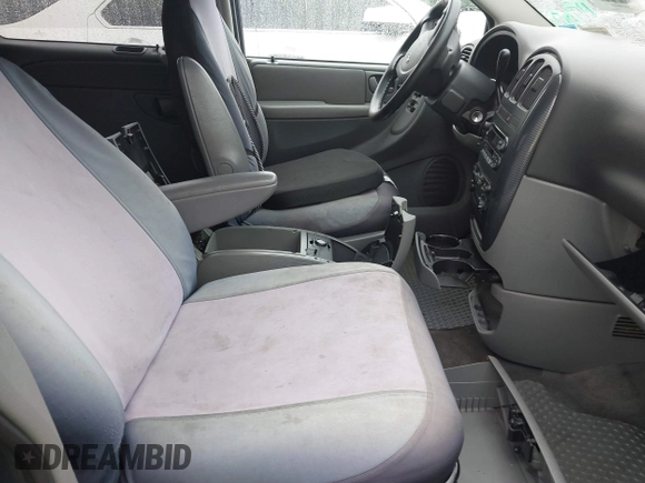 2005 Dodge Caravan SXT with VIN 1D4GP45R55B279825, listed as a IAAI auction lot 42532684 with 157,167 mi miles and . Bid and sale history available at DreamBid. Image 5.