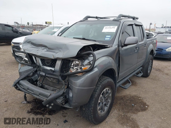 2017 Nissan Frontier SV z VIN 1N6DD0EV2HN745516, wystawiony jako IAAI lot #41231291 z przebiegiem 70 326 mil mil oraz . Historia ofert i sprzedaży dostępna na DreamBid. Obrazek 18.