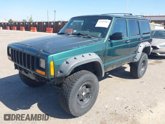 2001 Jeep Cherokee Sport z VIN 1J4FF48S81L513478, wystawiony jako IAAI lot #42245905 z przebiegiem 162 219 mil mil oraz . Historia ofert i sprzedaży dostępna na DreamBid. Obrazek 2.