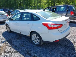 2012 Ford Focus SE with VIN 1FAHP3F27CL218986, listed as a IAAI auction lot 42633997 with 163,414 mi miles and . Bid and sale history available at DreamBid. Image 3.