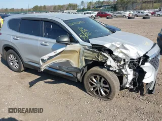 2019 Hyundai Santa Fe SE with VIN 5NMS23AD3KH102739, listed as a IAAI auction lot 42097252 with 116,023 mi miles and . Bid and sale history available at DreamBid. Image 1.