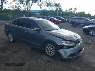 2014 Volkswagen Jetta SE with VIN 3VWD07AJ9EM277085, listed as a IAAI auction lot 42531957 with 171,613 mi miles and . Bid and sale history available at DreamBid. Image 1.