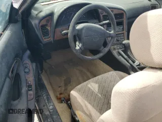 1997 Toyota Celica GT with VIN JT5FG02T1V0043181, listed as a Copart auction lot 76278144 with 101,686 mi miles and Salvage Title. Bid and sale history available at carsss.com. Image 8.