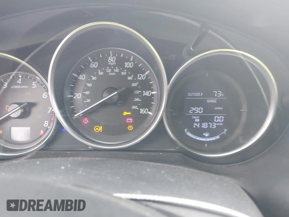 2016 Mazda CX-5 Grand Touring with VIN JM3KE2DYXG0890174, listed as a IAAI auction lot 42157884 with 141,873 mi miles. Bid and sale history available at carsss.com. Image 7.