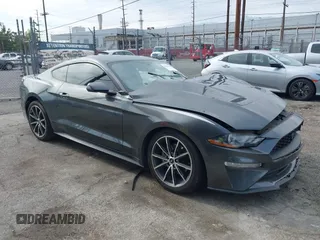 2019 Ford Mustang EcoBoost z VIN 1FA6P8TH2K5119105, wystawiony jako IAAI lot #42033627 z przebiegiem 57 942 mil mil oraz . Historia ofert i sprzedaży dostępna na DreamBid. Obrazek 1.