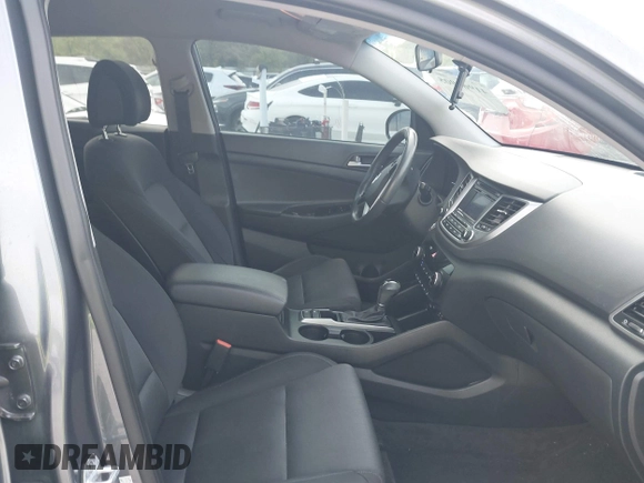 2016 Hyundai Tucson Limited with VIN KM8J33A27GU245096, listed as a IAAI auction lot 41961905 with 101,195 mi miles. Bid and sale history available at carsss.com. Image 5.