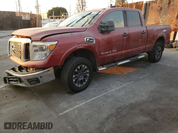 2016 Nissan Titan Pro-4X with VIN 1N6BA1F46GN516606, listed as a Copart auction lot 88129325 with 38,097 mi miles and Salvage title. Bid and sale history available at DreamBid. Image 1.
