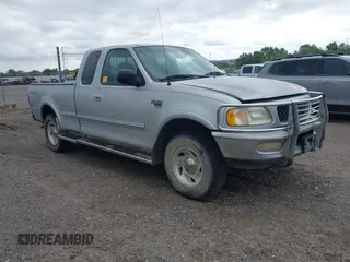 1998 Ford F-150 z VIN 2FTZX18W0WCA79737, wystawiony jako IAAI lot #42845443 z przebiegiem 186 132 mil mil oraz . Historia ofert i sprzedaży dostępna na DreamBid. Obrazek 1.