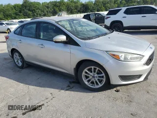 2015 Ford Focus SE with VIN 1FADP3F28FL234097, listed as a Copart auction lot 62660245 with 120,100 mi miles and Salvage title. Bid and sale history available at DreamBid. Image 4.