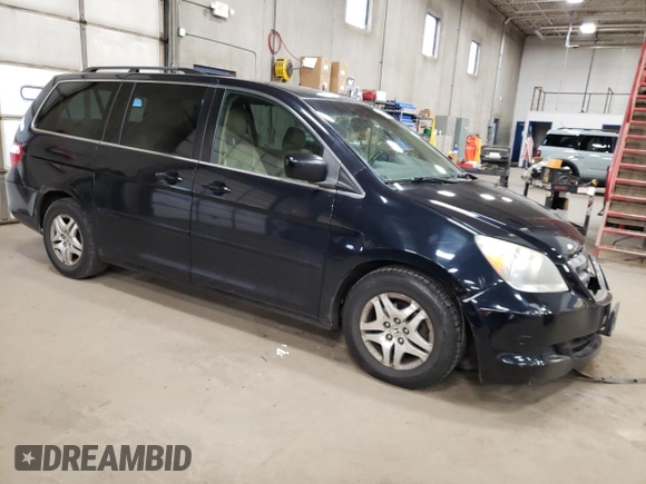 2007 Honda Odyssey EX-L with VIN 5FNRL38717B123111, listed as a Copart auction lot 52906645 with 235,188 mi miles and Salvage Title. Bid and sale history available at carsss.com. Image 4.