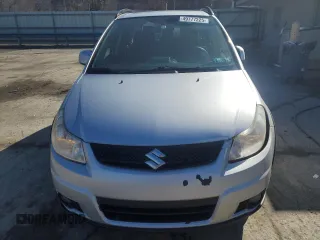 2012 Suzuki SX4 Crossover with VIN JS2YB5A31C6303749, listed as a Copart auction lot 49777225 with 220,017 mi miles and Salvage Title. Bid and sale history available at DreamBid. Image 5.