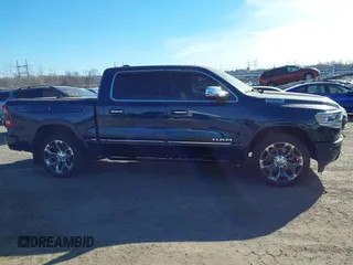 2020 Ram 1500 Limited with VIN 1C6SRFHT0LN146123, listed as a IAAI auction lot 41407810 with 117,206 mi miles and . Bid and sale history available at DreamBid. Image 13.