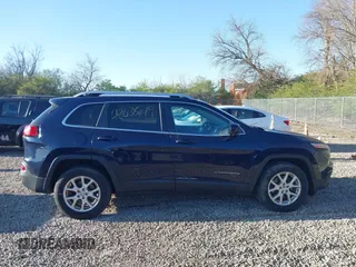 2015 Jeep Cherokee Latitude with VIN 1C4PJMCB1FW709560, listed as a IAAI auction lot 42035619 with 162,354 mi miles. Bid and sale history available at carsss.com. Image 13.