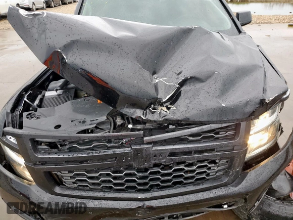 2018 Chevrolet Tahoe LT with VIN 1GNSCBKC3JR351640, listed as a Copart auction lot 50493995 with 135,603 mi miles and Salvage title. Bid and sale history available at DreamBid. Image 12.