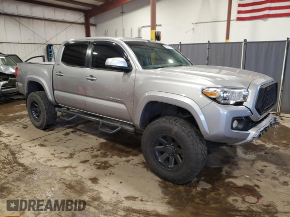 2017 Toyota Tacoma SR5 with VIN 3TMCZ5AN2HM078671, listed as a Copart auction lot 58491345 with 115,219 mi miles and Salvage title. Bid and sale history available at DreamBid. Image 4.