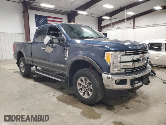 2017 Ford F-350 Lariat with VIN 1FT8X3BT5HEE16468, listed as a Copart auction lot 57251455 with 92,951 mi miles and Salvage title. Bid and sale history available at DreamBid. Image 4.