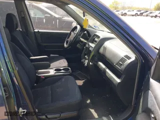 2005 Honda CR-V LX with VIN JHLRD68565C010765, listed as a IAAI auction lot 41843854 with 248,201 mi miles. Bid and sale history available at carsss.com. Image 5.