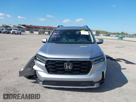 2023 Honda Pilot Elite with VIN 5FNYG1H83PB018826, listed as a IAAI auction lot 41301261 with 23,252 mi miles. Bid and sale history available at carsss.com. Image 12.