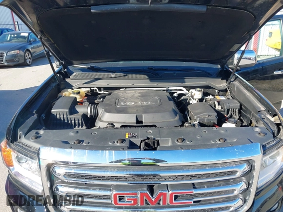 2015 GMC Canyon 4WD SLT z VIN 1GTG6CE33F1134747, wystawiony jako IAAI lot #41502300 z przebiegiem 143 027 mil mil oraz . Historia ofert i sprzedaży dostępna na DreamBid. Obrazek 10.