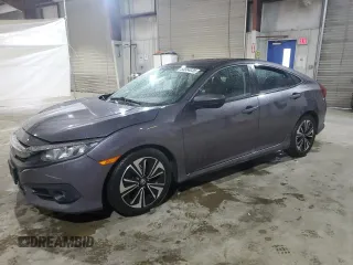 2016 Honda Civic EX-L with VIN 19XFC1F7XGE208349, listed as a Copart auction lot 55564035 with 138,404 mi miles and Salvage title. Bid and sale history available at DreamBid. Image 1.