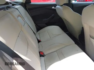 2016 Ford Focus Titanium with VIN 1FADP3N26GL332709, listed as a IAAI auction lot 42458997 with 75,509 mi miles and . Bid and sale history available at DreamBid. Image 8.