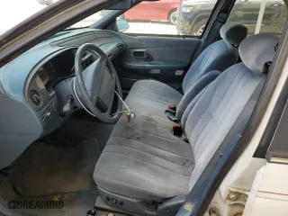 1992 Ford Taurus GL with VIN 1FALP52U5NA280821, listed as a Copart auction lot 77457304 with 33,484 mi miles and Salvage Title. Bid and sale history available at carsss.com. Image 7.