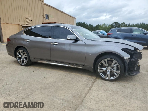 2015 Infiniti Q70 z VIN JN1BY1PR6FM831034, wystawiony jako Copart lot #51889835 z przebiegiem 128 220 mil mil oraz Szkoda całkowita • Salvage title. Historia ofert i sprzedaży dostępna na DreamBid. Obrazek 4.