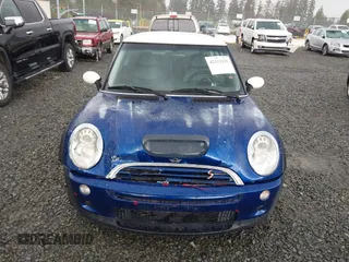 2003 MINI Hardtop S z VIN WMWRE33433TD60388, wystawiony jako IAAI lot #42313209 z przebiegiem 125 869 mil mil oraz . Historia ofert i sprzedaży dostępna na DreamBid. Obrazek 12.