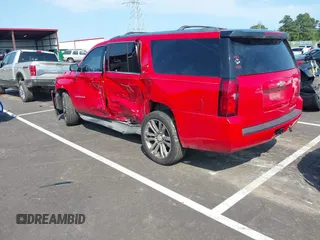 2015 Chevrolet Suburban LT with VIN 1GNSCJKC8FR291713, listed as a IAAI auction lot 42323281 with 226,708 mi miles and . Bid and sale history available at DreamBid. Image 3.
