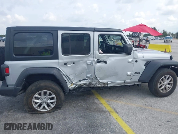 2023 Jeep Wrangler Sport S with VIN 1C4HJXDNXPW702199, listed as a IAAI auction lot 41859413 with 24,942 mi miles and . Bid and sale history available at DreamBid. Image 6.