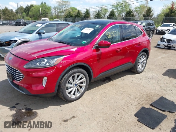 2021 Ford Escape Titanium Hybrid with VIN 1FMCU9DZ9MUA15184, listed as a IAAI auction lot 42093809 with 48,983 mi miles and . Bid and sale history available at DreamBid. Image 18.